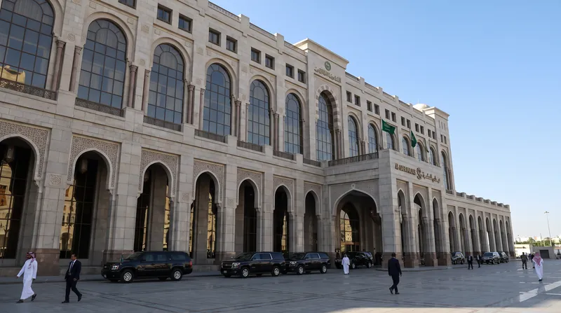 Exterior view of the Al-Safa Palace in Mecca, Saudi Arabia, featuring traditional Islamic architecture under a clear sky.