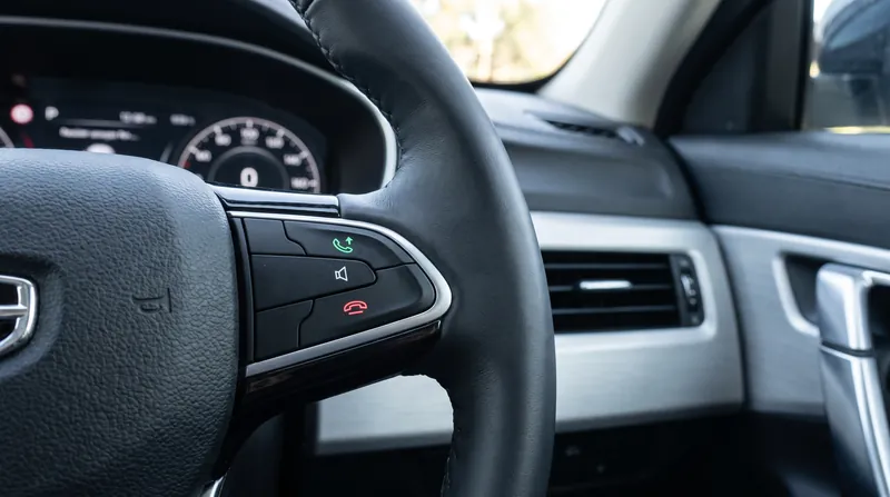 The Bluetooth Hands-Free Profile integrates directly with the vehicle's native steering wheel controls.