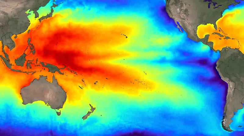 Satellite thermal map of the Pacific Ocean showing a large red pool of warm water in the west.