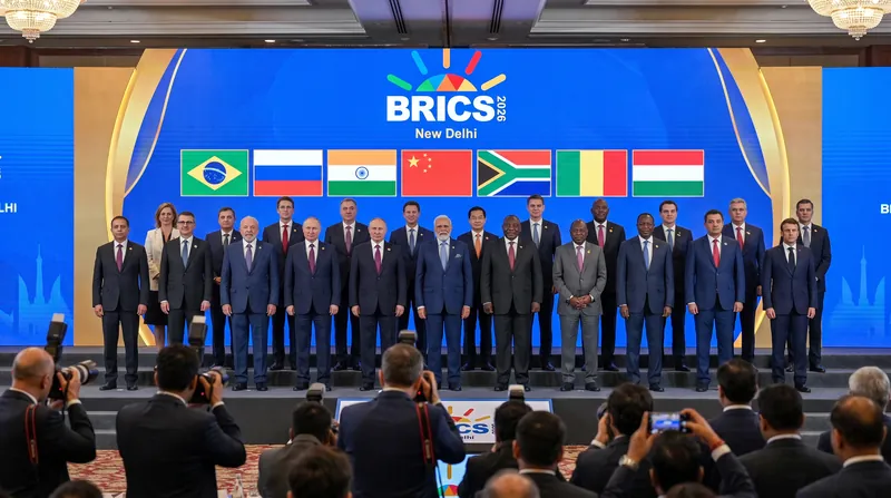 World leaders standing together for a group photograph at the BRICS Summit in New Delhi.