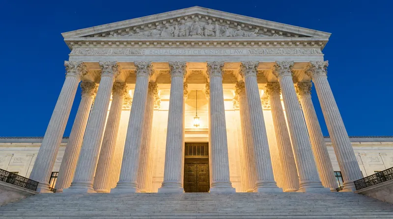 The exterior facade and marble columns of the United States Supreme Court building in Washington D.C.