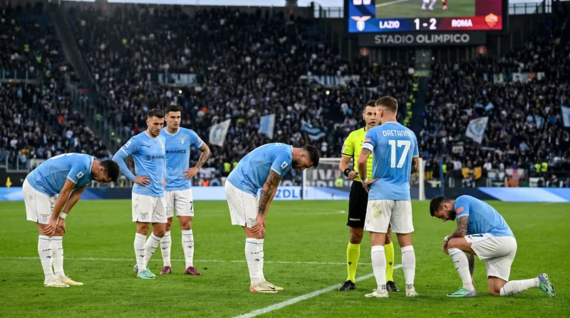 Lazio players react after surrendering their two-goal advantage in the second half.
