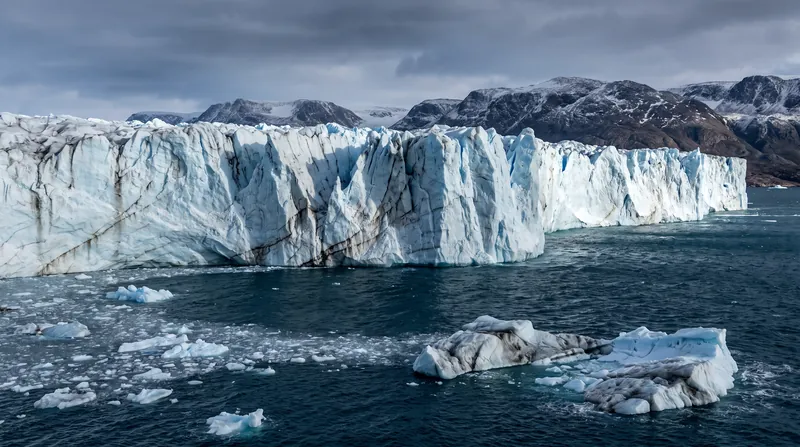Glaciers in Greenland and Antarctica are flowing into the ocean at accelerating rates, driving the majority of polar ice loss over the last 50 years.