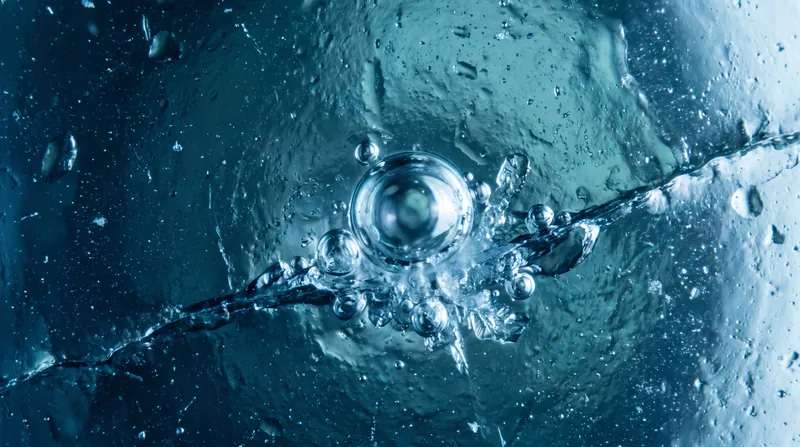 Bubbles require microscopic imperfections, known as nucleation sites, to form and grow within the liquid.