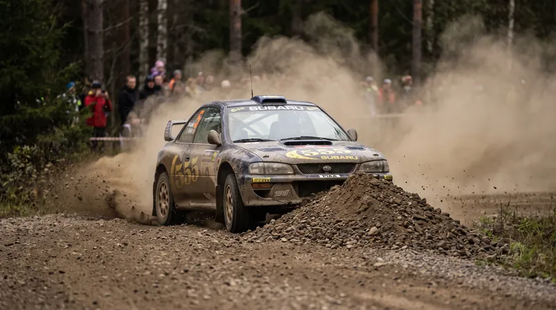 On loose surfaces like gravel, a locked wheel builds a wedge of material that stops the car faster than a rolling wheel, requiring different ABS calibrations.