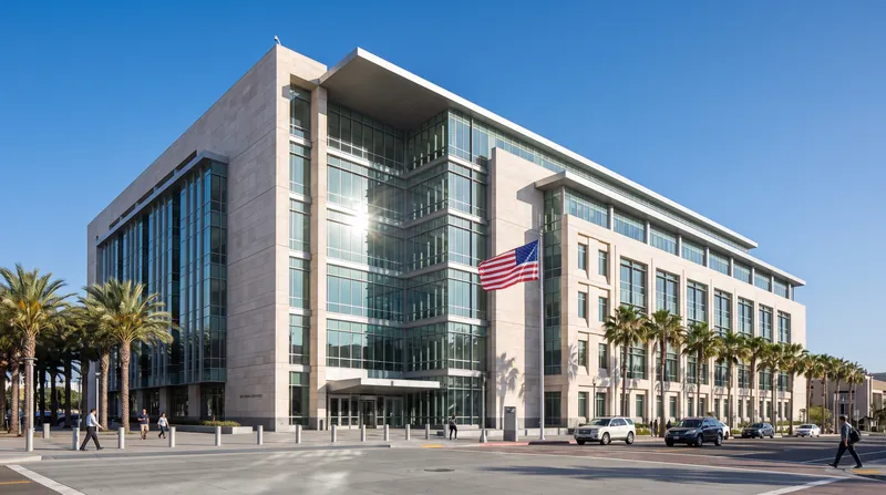 Exterior view of a federal courthouse building in San Diego, California, under clear daylight.
