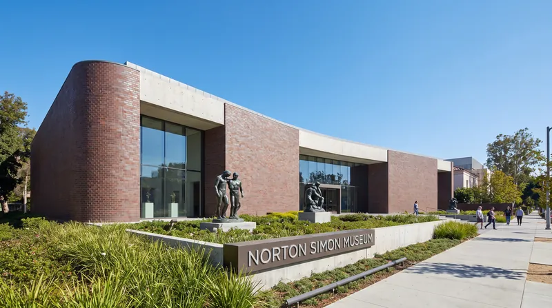 The exterior of the Norton Simon Museum in Pasadena, California, featuring modern architecture and landscaped grounds.