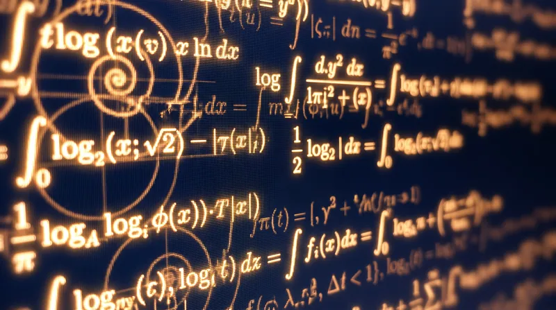 A glowing computer screen displaying complex mathematical formulas and logarithmic curves in bright amber against a dark navy background.