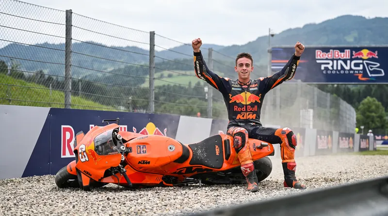 Acosta celebrated his maiden win by laying his bike down at the exact corner where he crashed out of Saturday's sprint race.