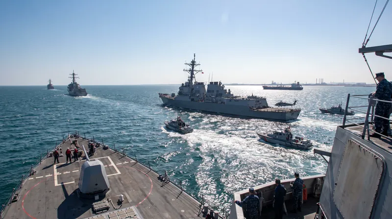 Naval forces remain on high alert in the region as Washington evaluates the Iranian demands.