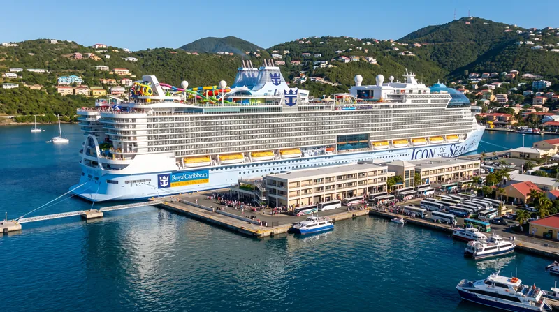 Royal Caribbean's move into land-based resorts aims to capture travelers who alternate between cruising and hotel stays.