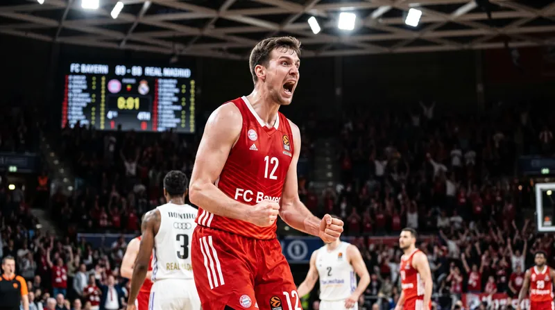Johannes Voigtmann's late three-pointer sealed a thrilling victory for Bayern Munich.