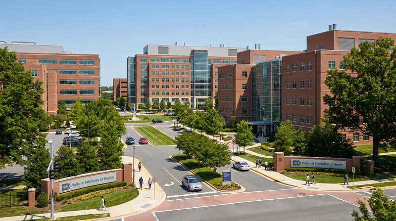 Exterior view of the National Institutes of Health headquarters building in Bethesda, Maryland on a bright day.
