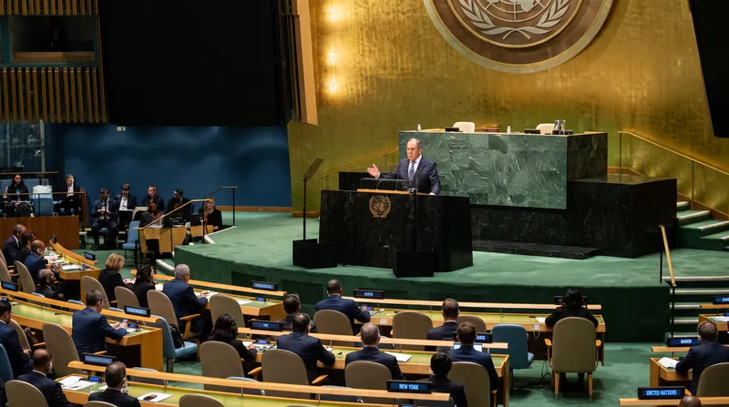 Russian Foreign Minister Sergey Lavrov stands at the podium of the United Nations General Assembly hall.