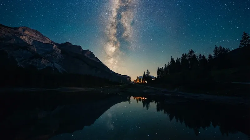 The darkness of the night sky is a direct consequence of the universe's finite age and expanding geometry.