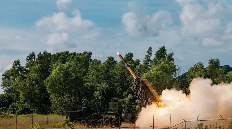 A U.S. Army Patriot M903 missile launcher deployed in a desert testing environment.