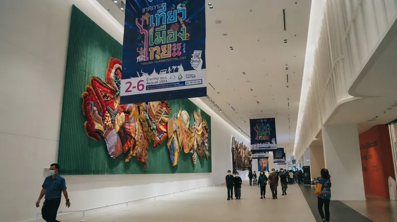 Exterior view of the Queen Sirikit National Convention Center in Bangkok displaying World Bank meeting banners.
