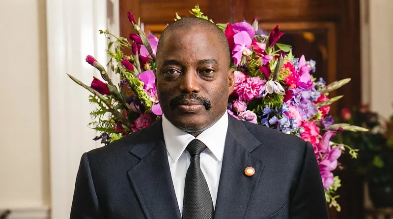 Former Democratic Republic of Congo President Joseph Kabila speaking at a public event.