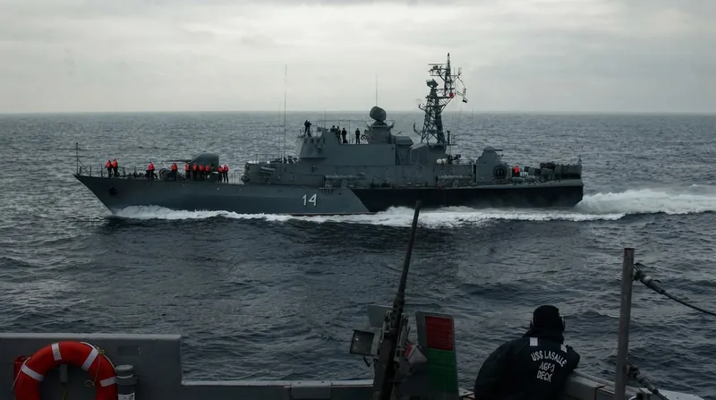 A Bulgarian Navy patrol vessel navigates the choppy waters of the Black Sea at dawn.