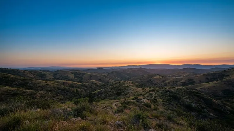 Illustration: At sunset, sunlight travels through up to 40 times more atmosphere, scattering the blue light away entirely and leaving only the longer red wavelengths.