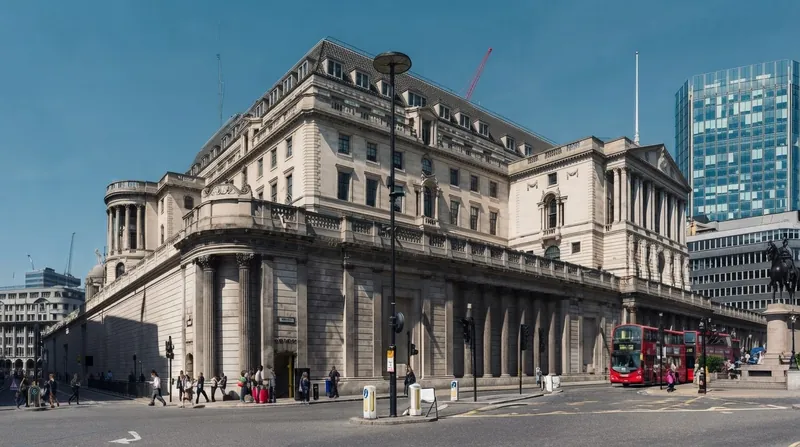 The neoclassical stone facade and columns of the Bank of England headquarters in London.