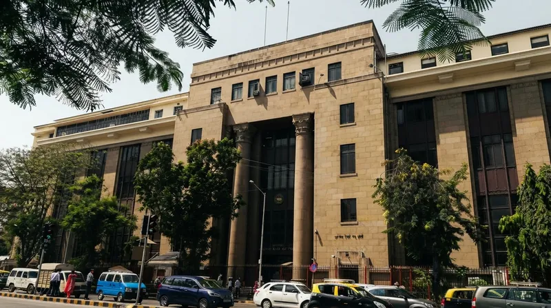 Exterior view of the Reserve Bank of India headquarters building in Mumbai during the daytime.