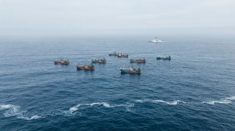 Illustration: Taiwanese officials report that Beijing is increasingly integrating civilian fishing fleets with coast guard cutters to project power.