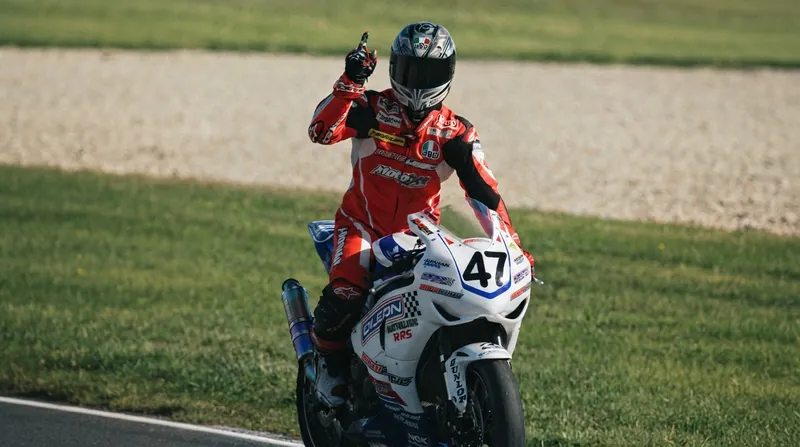 Riders completed a low-speed parade lap to acknowledge the fans who braved the extreme weather.