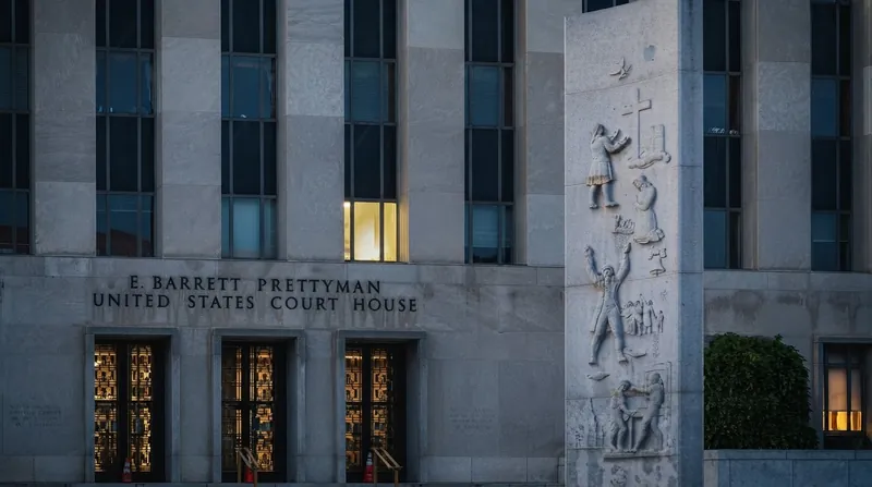 Exterior view of the United States federal courthouse in Washington D.C. featuring stone columns.